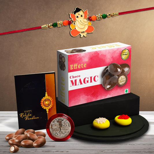 Multicolor Orange Rakhi  Bracelet (K1_255_cm32)  Chocolate Magic 32gm With Silver Color Pooja Coin Roli Chawal  Greeting Card  Occasion  Rakhi For Brother With Gift  Rakhi With Chocolate Rakhi Combo For Brother  Set Of 1 Rakhi  Rak